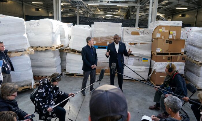 Pallets of aid to Ukraine are stacked behind Secretary of Defense Lloyd Austin (R) and Secretary of State Antony Blinken (L) as they speak with reporters after returning from their trip to Kyiv, Ukraine, and meeting with Ukrainian President Volodymyr Zelenskyy, in Poland near the Ukraine border on April 25, 2022. (Alex Brandon/Pool/AFP via Getty Images)