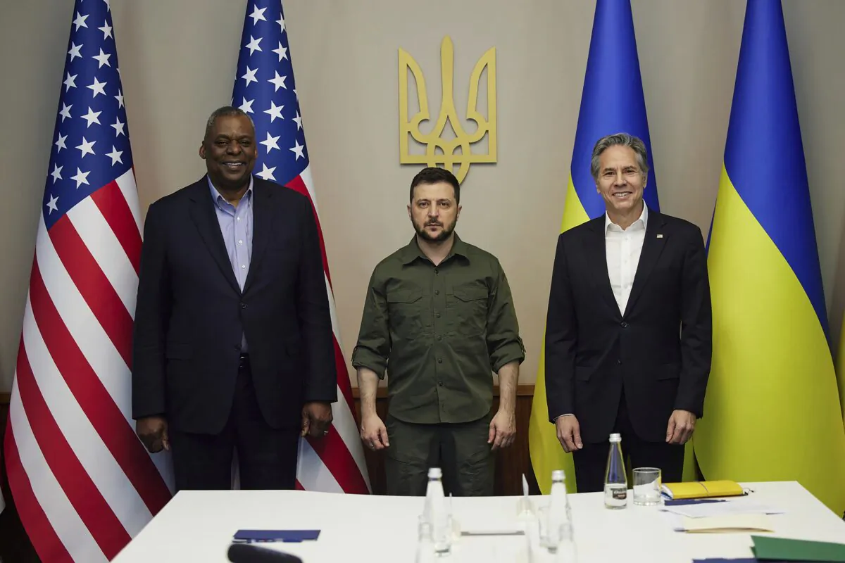 In this image from video provided by the Ukrainian Presidential Press Office, from left, U.S. Secretary of Defense Lloyd Austin, Ukrainian President Volodymyr Zelenskyy, and U.S. Secretary of State Antony Blinken pose for a picture during their meeting in Kyiv, Ukraine, on April 25, 2022. (Ukrainian Presidential Press Office via AP)