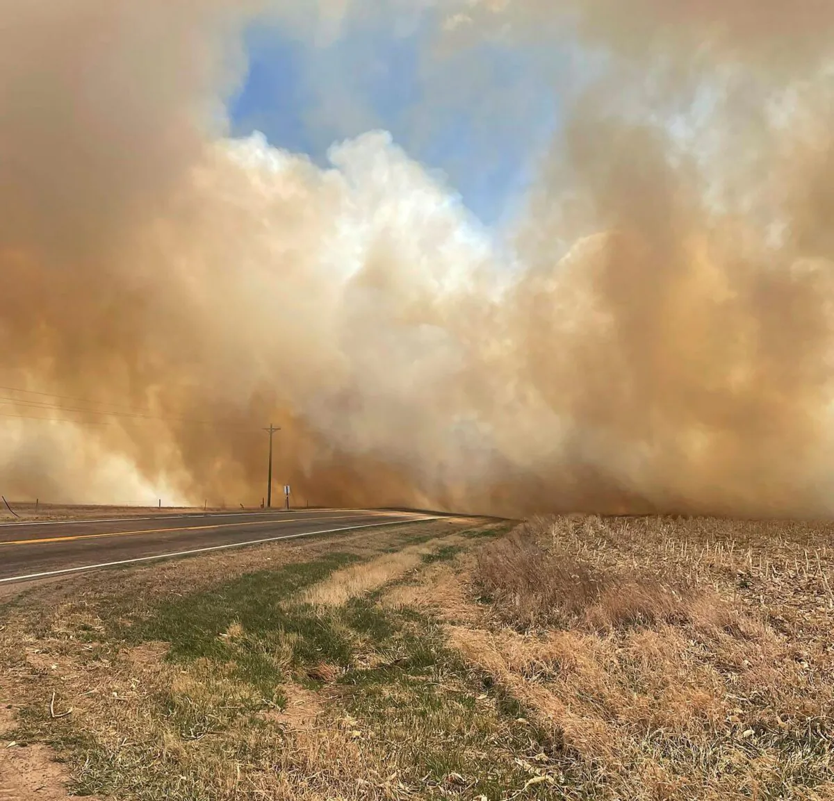 The smoke from a wildfire near Cambridge, Neb. Several small towns, including Cambridge, Bartley, Indianola and Wilsonville, in Nebraska's southwest and Macy in its northeast on April 23, 2022. (Nebraska State Patrol via AP)