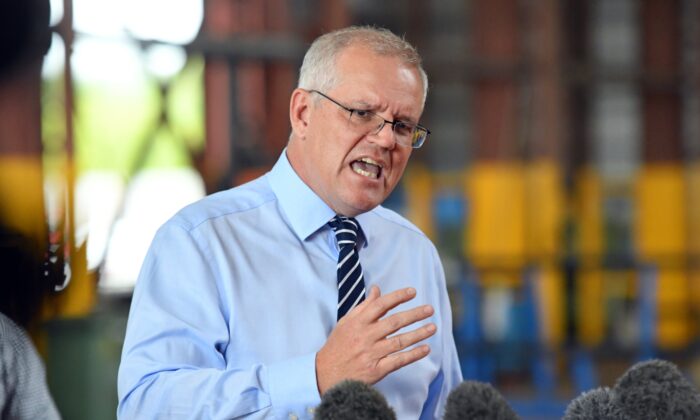 Prime Minister Scott Morrison at a press conference after visiting TEi engineering and steel fabrication company in the seat of Herbert, Queensland in Australia on April 26, 2022. (AAP Image/Mick Tsikas)