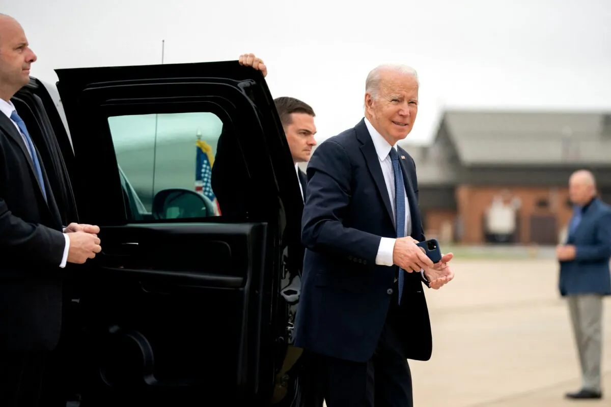 President Joe Biden walks to board Air Force One at Delaware Air National Guard base in New Castle, Del., on April 25, 2022. (Stefani Reynolds/AFP via Getty Images)