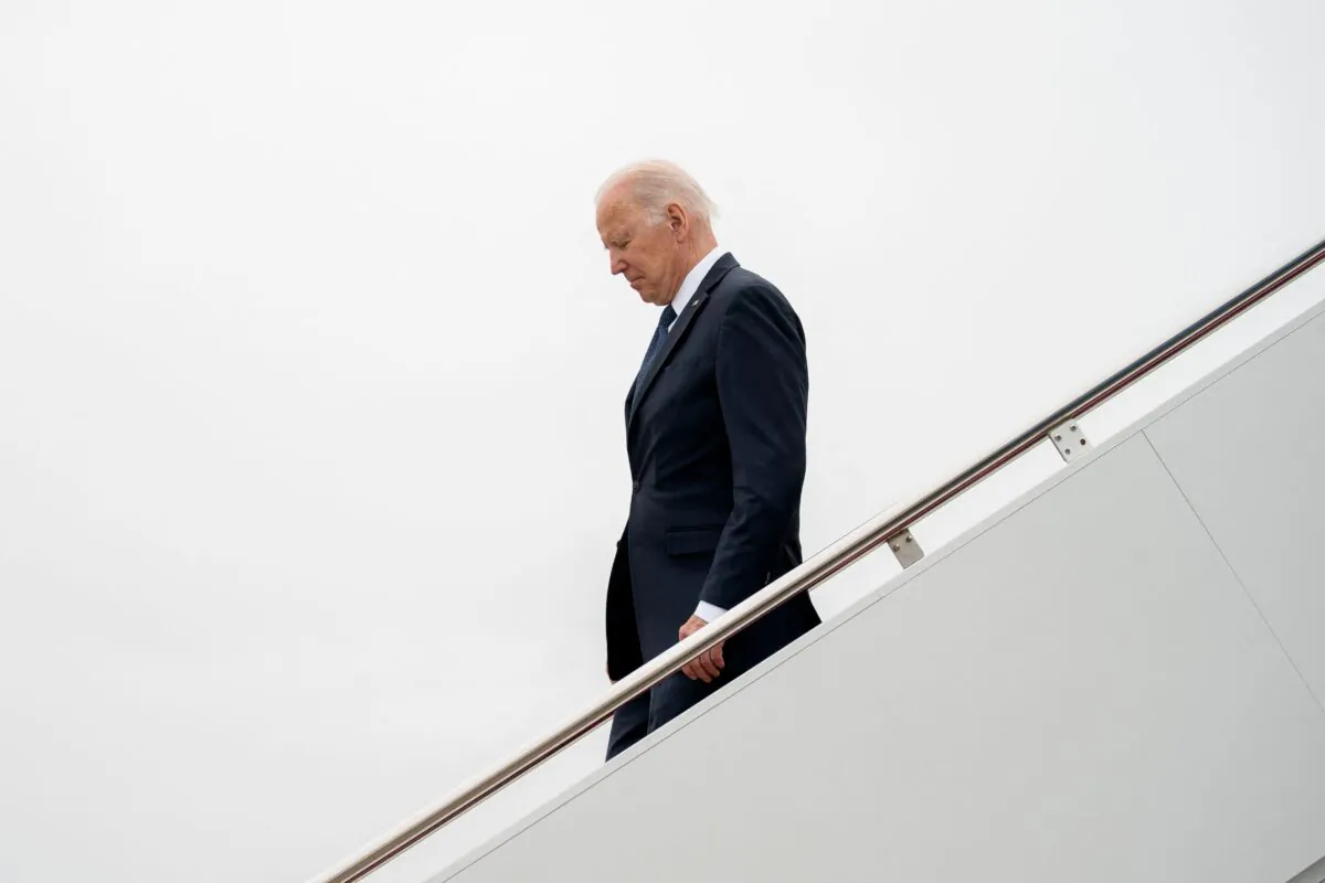 President Joe Biden disembarks Air Force One at Joint Base Andrews in Maryland on April 25, 2022. (Stefani Reynolds/AFP via Getty Images)