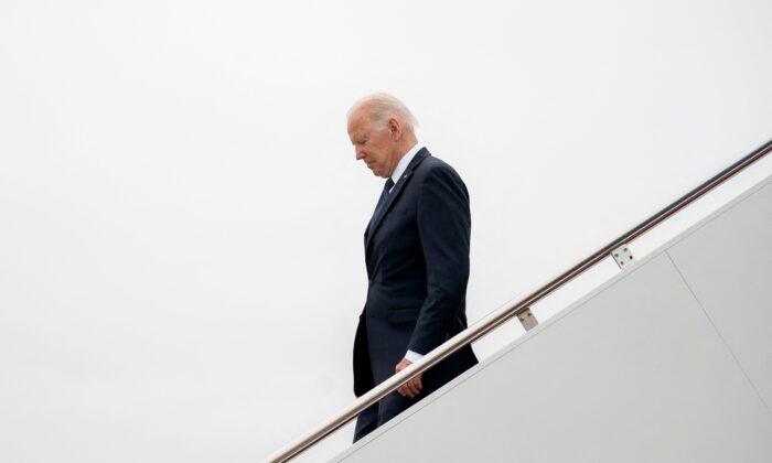 President Joe Biden disembarks Air Force One at Joint Base Andrews in Maryland on April 25, 2022. (Stefani Reynolds/AFP via Getty Images)