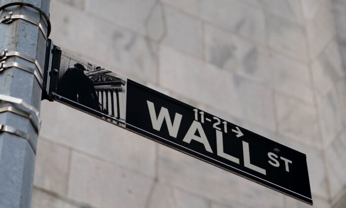 A Wall Street sign is shown in the Financial District in the Manhattan borough of New York, on Oct. 13, 2021. (John Minchillo/AP Photo)