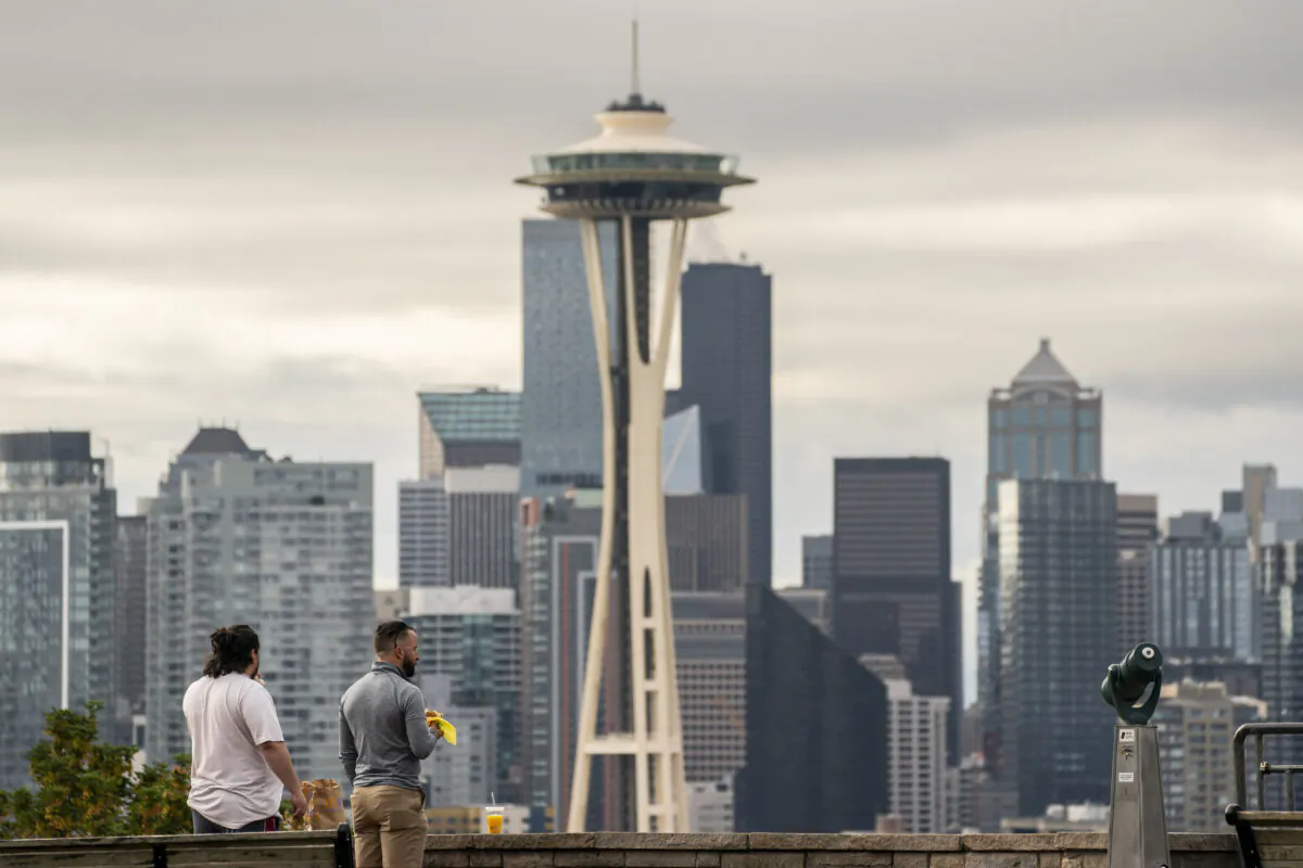 People take in a view of the skyline in Seattle, Washington on June 10, 2021. (David Ryder/Getty Images)