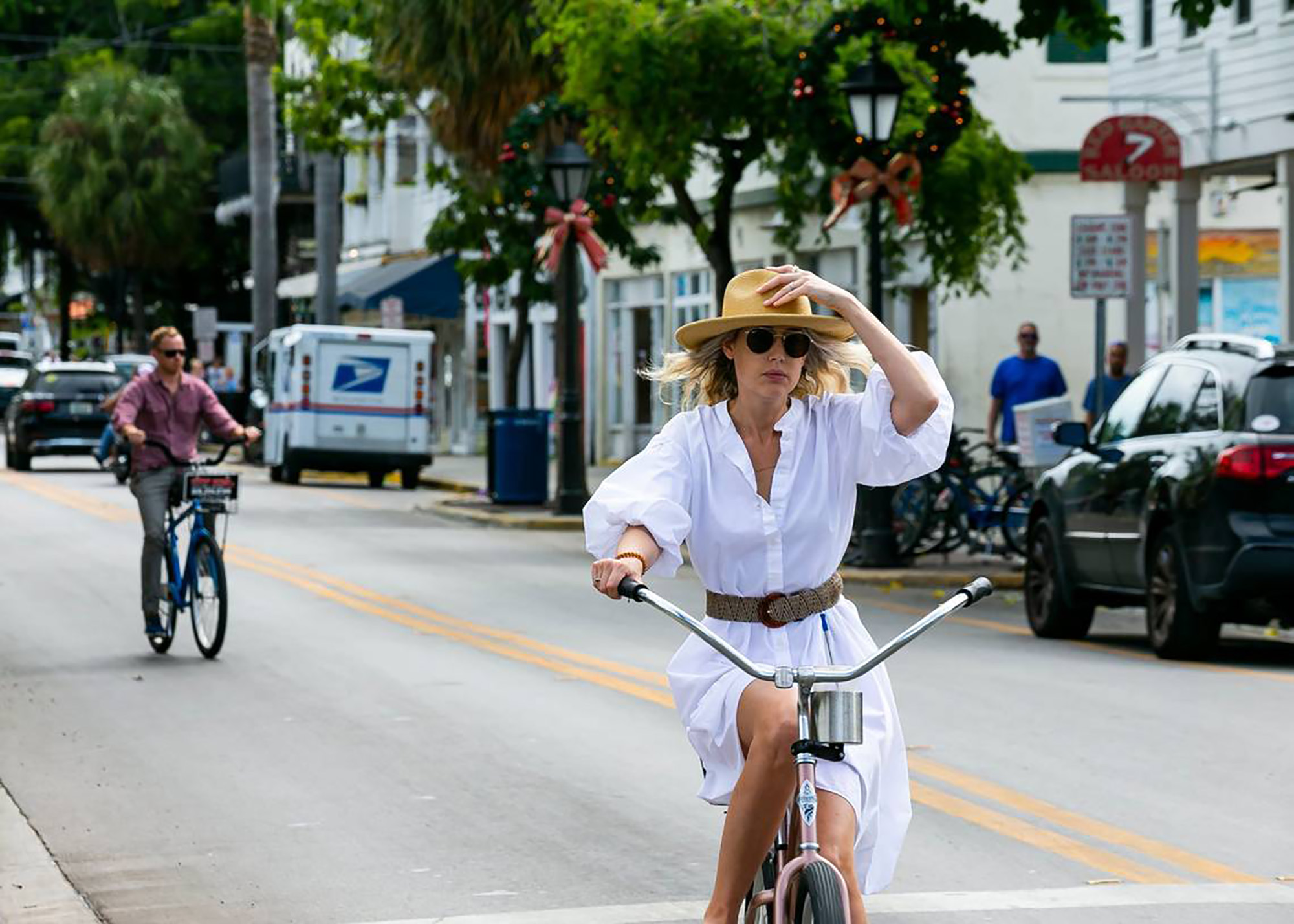 Cyclists make their way down Duval Street in Key West, Florida, on Dec. 12, 2021. 