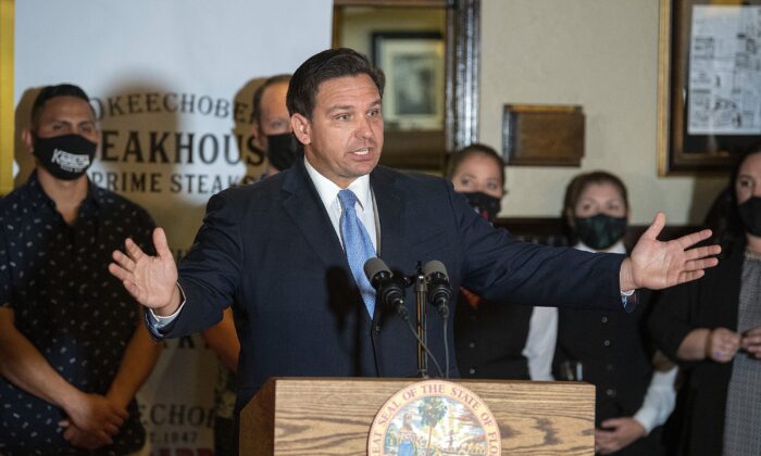 A file photo shows Florida Gov. Ron DeSantis speaks at a news conference at Okeechobee Steakhouse in West Palm Beach, Fla., on Dec. 15, 2020. (Michael Laughlin/South Florida Sun Sentinel/TNS)