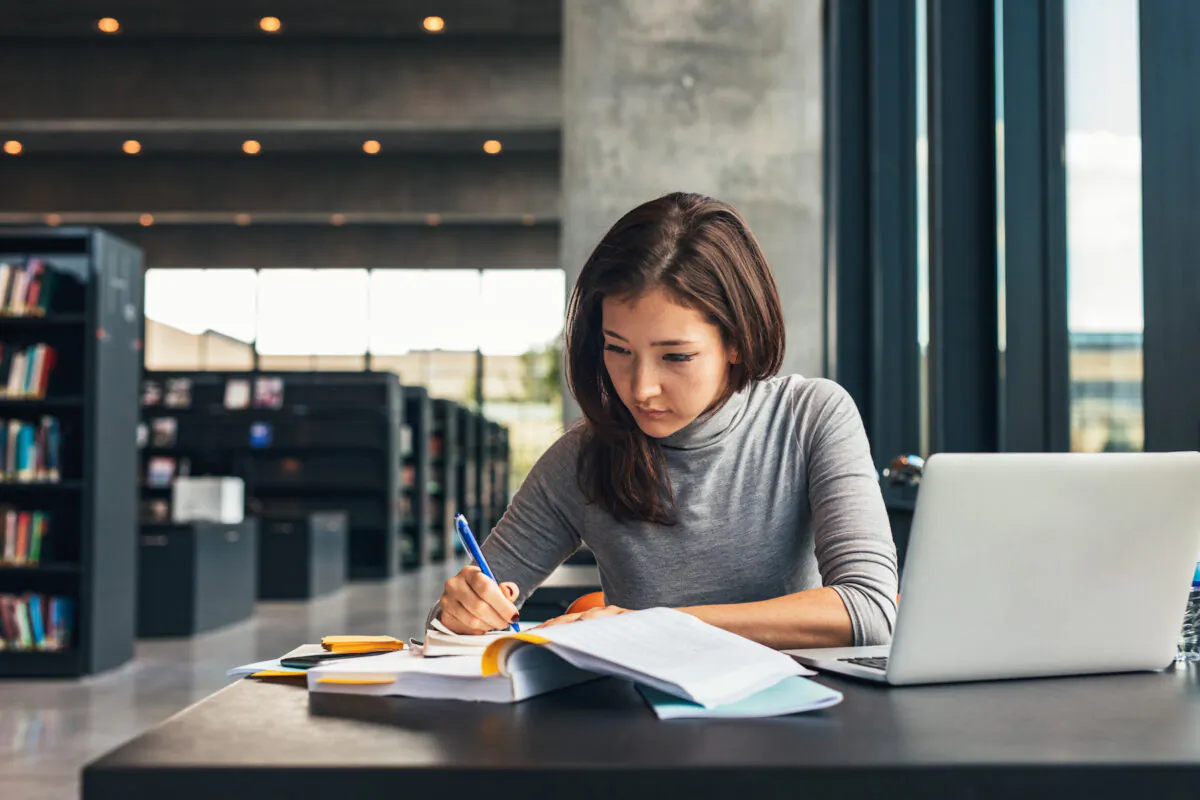 Taking short constructive breaks while reading a textbook—to jot down questions, for example—every 15 minutes or so amplifies learning and retention. (Jacob Lund/Shutterstock)