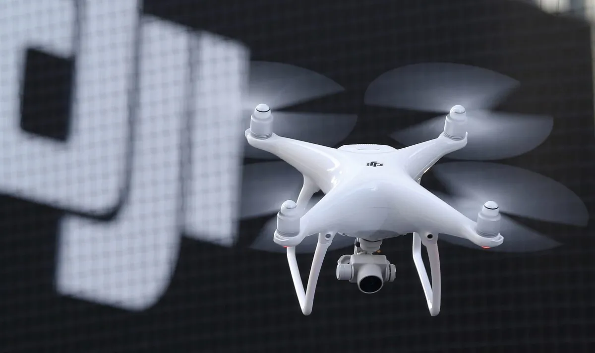 A Phantom 4, developed by major Chinese consumer-drone maker DJI, flies during its demonstration flight in Tokyo, Japnan, on March 3, 2016. (Shizuo Kambayashi/AP Photo)