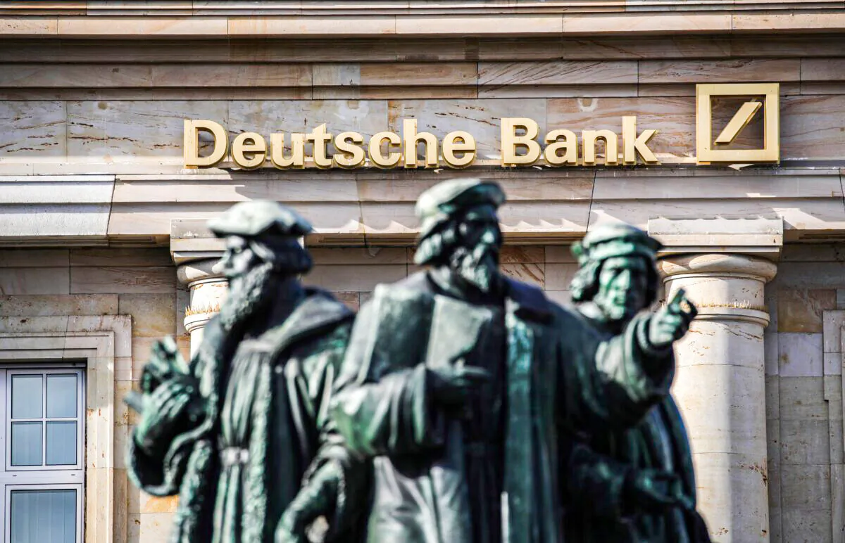 The logo of Deutsche Bank is seen on one of their branches in Frankfurt am Main, western Germany on Feb. 4, 2021. (Armando Babani/AFP via Getty Images)