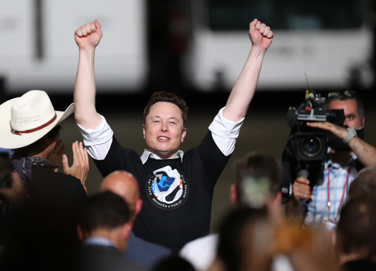 Elon Musk celebrates after the successful launch of the SpaceX Falcon 9 rocket at the Kennedy Space Center in Cape Canaveral, Fla., on May 30, 2020.  (Joe Raedle/Getty Images)