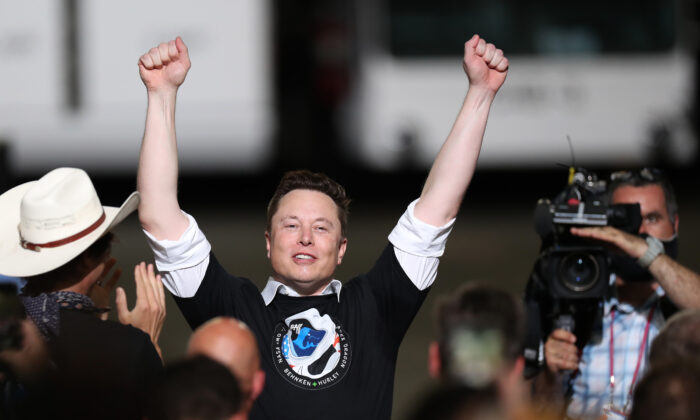 Elon Musk celebrates after the successful launch of the SpaceX Falcon 9 rocket at the Kennedy Space Center in Cape Canaveral, Fla., on May 30, 2020.  (Joe Raedle/Getty Images)