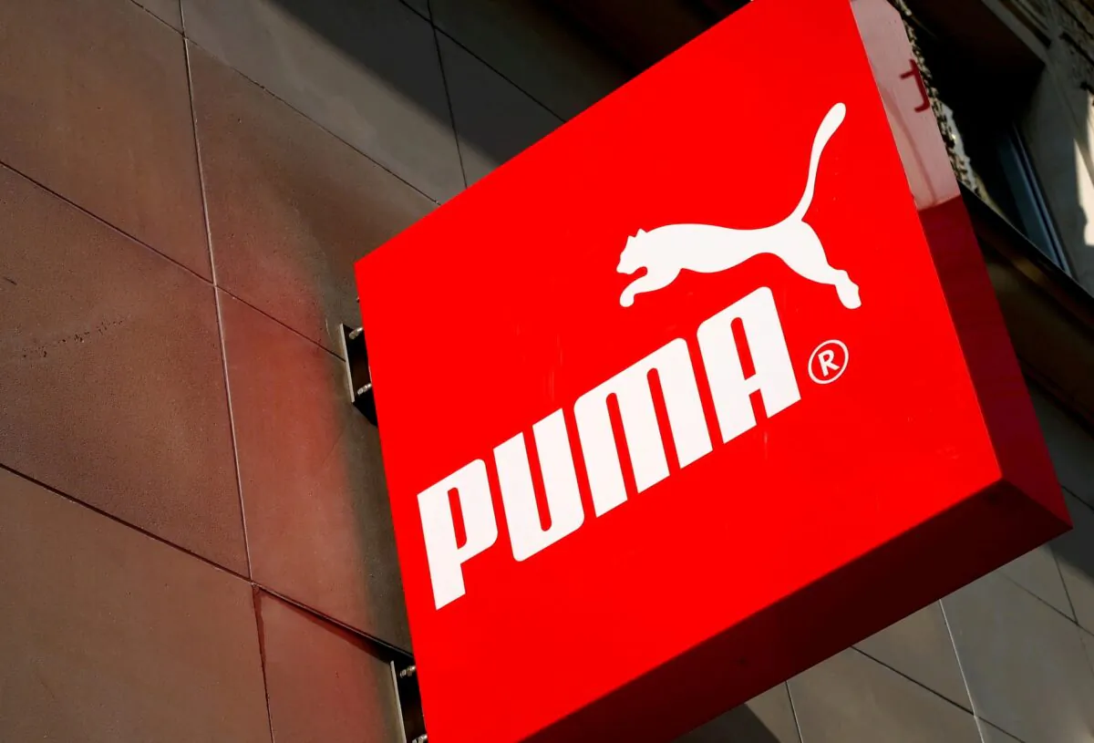 The logo of German sports goods firm Puma at the entrance of one of its stores in Vienna on March 18, 2016. (Leonhard Foeger/Reuters)