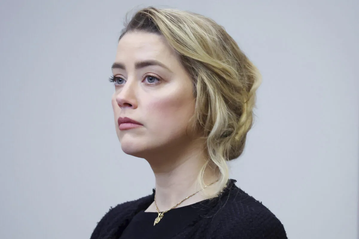 Actor Amber Heard arrives in the courtroom at the Fairfax County Circuit Court in Fairfax, Va., on April 28, 2022. (Michael Reynolds/Pool Photo via AP)