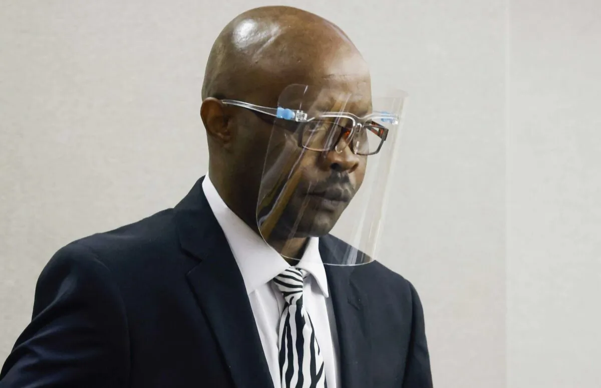 Accused serial killer Billy Chemirmir enters the courtroom after a recess during his retrial at Frank Crowley Courts Building in Dallas on April 25, 2022. (Shafkat Anowar/The Dallas Morning News via AP, Pool)