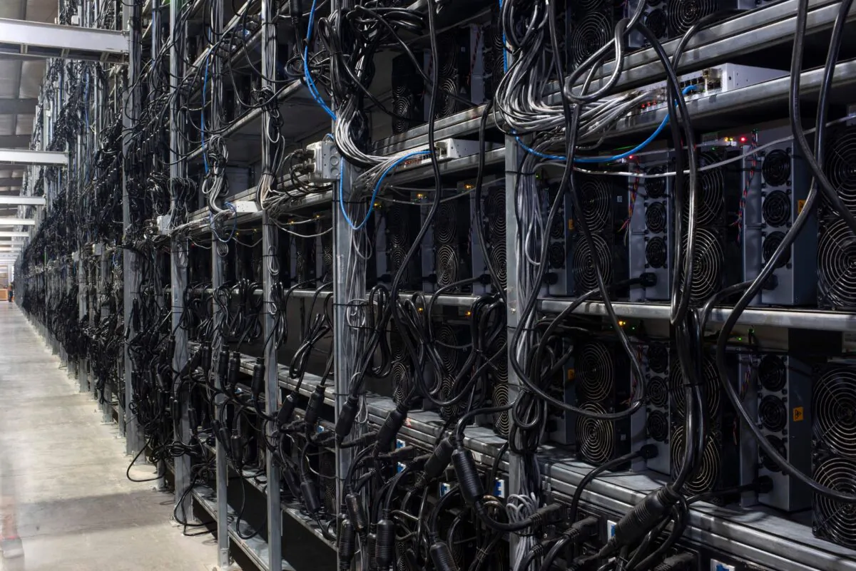 Bitcoin mining machines in a warehouse at a mining facility in Rockdale, Texas, on Oct. 10, 2021. (Mark Felix/AFP/Getty Images/TNS)
