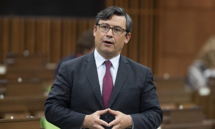 Conservative MP Michael Chong rises during Question Period in the House of Commons in Ottawa on May 31, 2021. (Adrian Wyld/The Canadian Press)