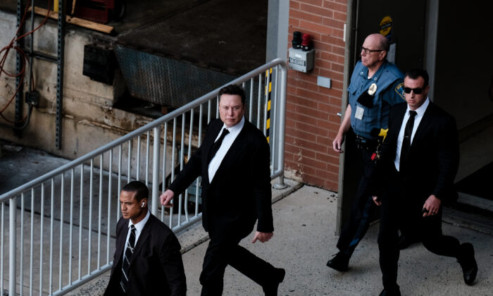 Tesla founder Elon Musk leaves a courthouse after testifying in a court case in Wilmington, Delaware, on July 12, 2021. (Michael A. McCoy/Getty Images)