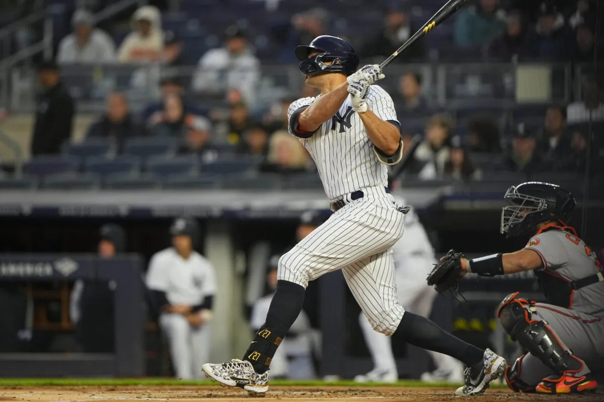 New York Yankees right fielder Giancarlo Stanton (C) hits a two-run home run against the Baltimore Orioles during the first inning at Yankee Stadium in New York, on Apr 27, 2022. (Gregory Fisher/USA TODAY Sports via Field Level Media)