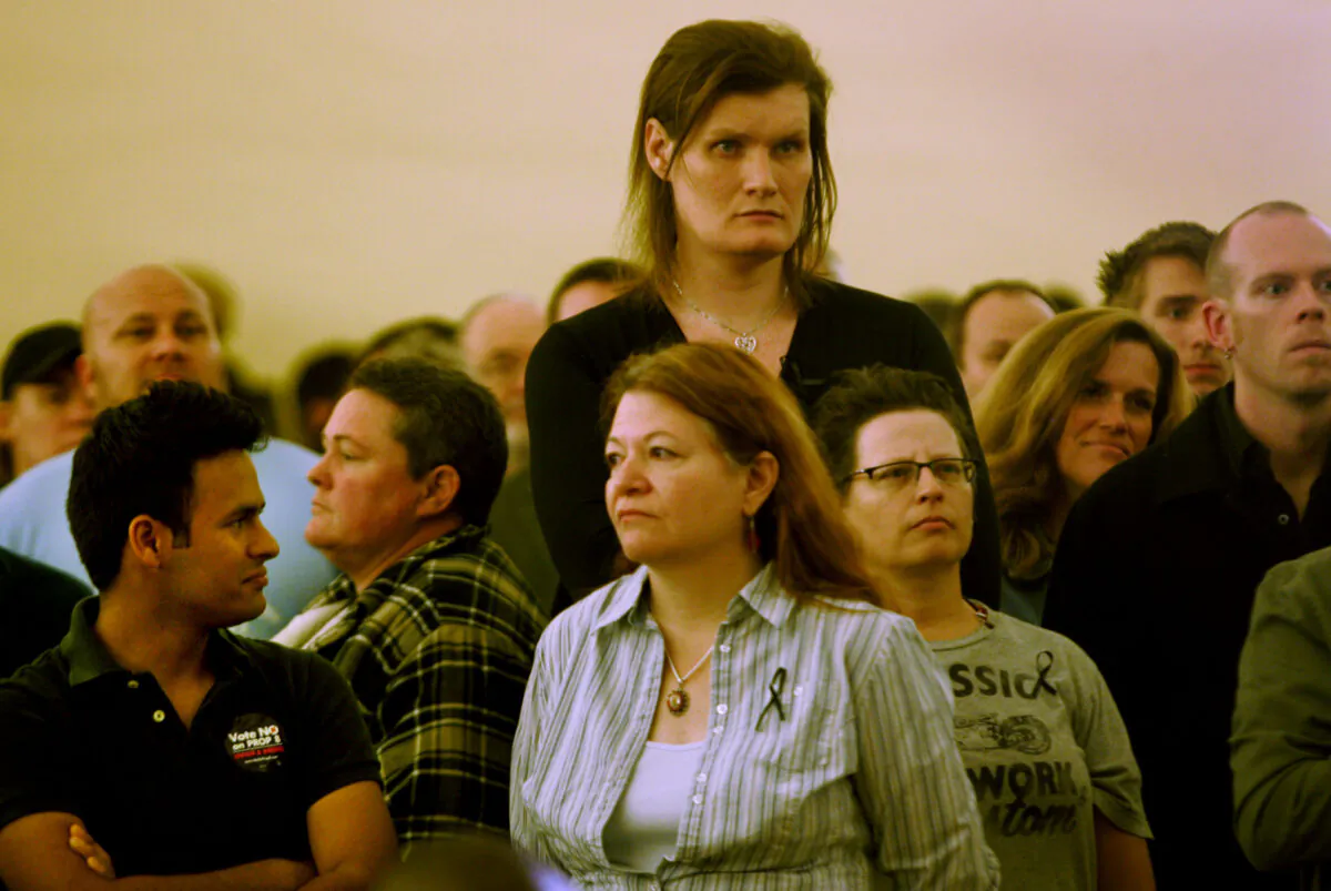 In this file photo, members of the community listen to speakers during a rally at the San Diego Lesbian Gay Bisexual Transgender Community Center in San Diego on November 5, 2008. (Sandy Huffaker/Getty Images)