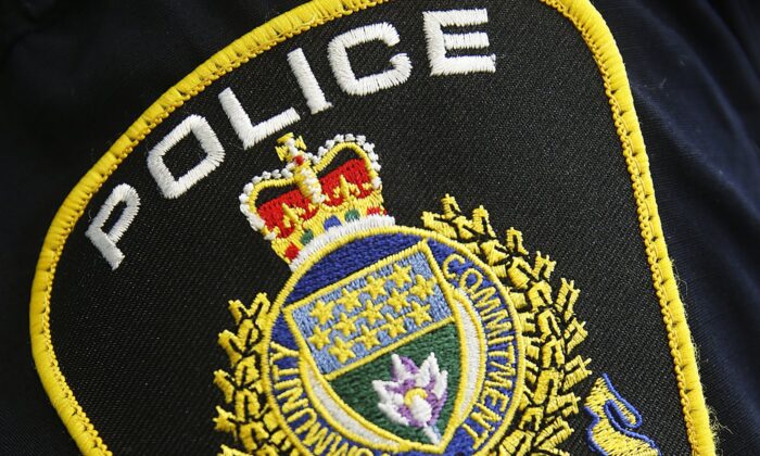 Photo of a Winnipeg Police Service shoulder badge on an officer on Nov. 5, 2019. (The Canadian Press/John Woods)