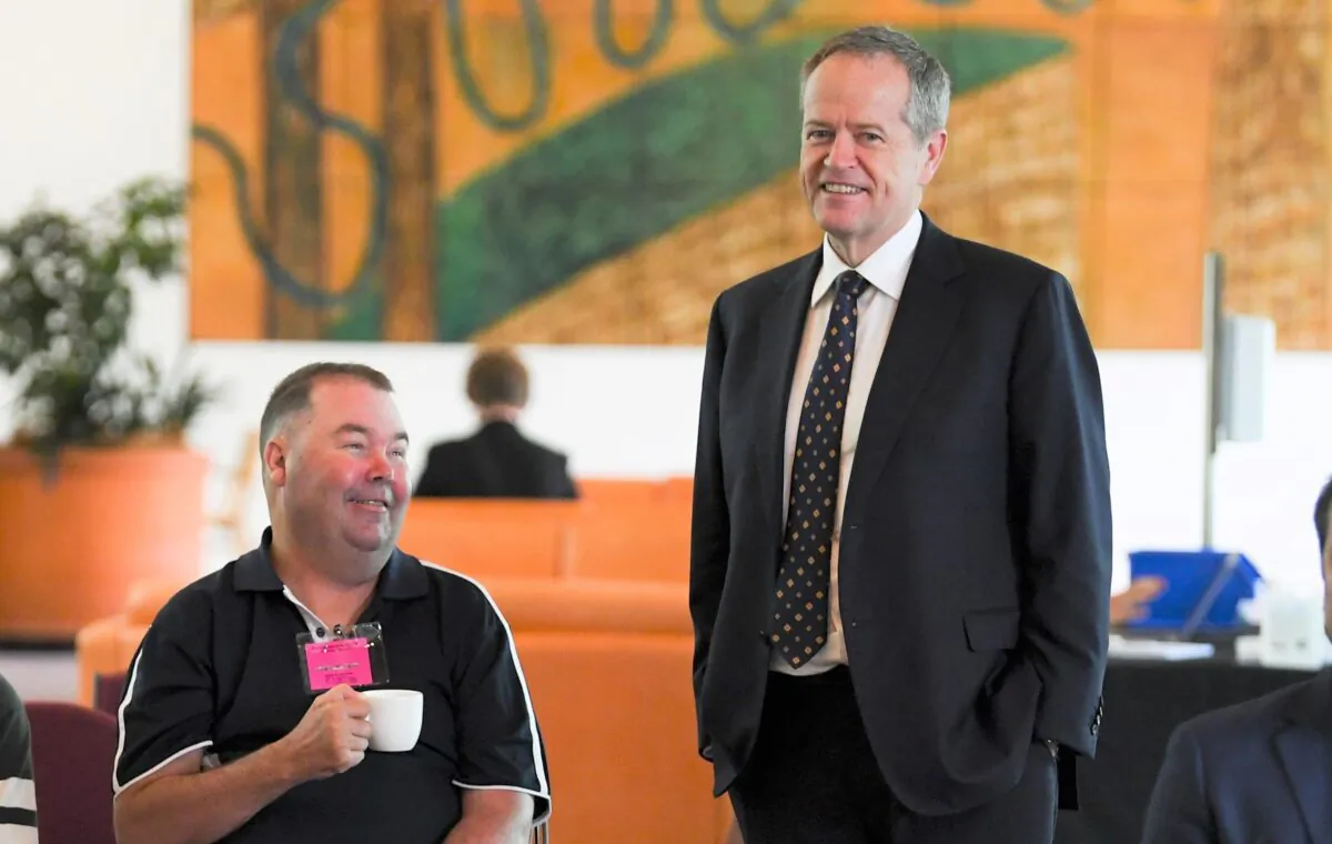 NDIS Minister Bill Shorten speaks to participants during an event to celebrate International Day of people with a disability at Parliament House in Canberra, Australia, on Dec. 3, 2020. (AAP Image/Lukas Coch) 