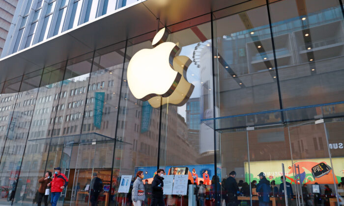 Customers shop at apple's flagship store on Nanjing Road pedestrian street in Shanghai, China, Feb. 23, 2022. (Costfoto/Future Publishing via Getty Images)