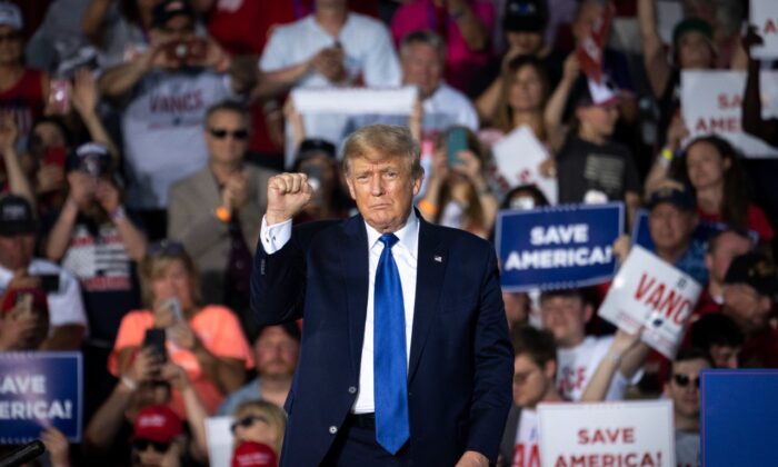 Former U.S. President Donald Trump gestures after speaking during a rally hosted by the former president at the Delaware County Fairgrounds on April 23, 2022 in Delaware, Ohio. The week earlier, Trump announced his endorsement of J.D. Vance in the Ohio Republican Senate primary. (Photo by Drew Angerer/Getty Images)