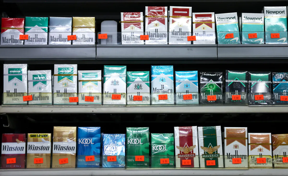 Packs of menthol-flavored and non-menthol cigarettes are displayed for sale in a smoke shop in Los Angeles on April 28, 2022. (Mario Tama/Getty Images)