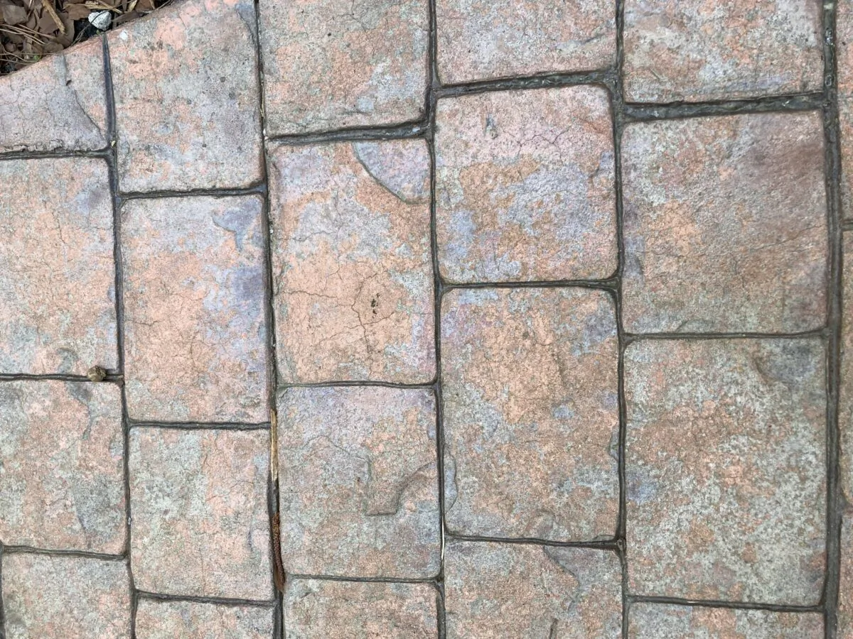 Stamped concrete color can fade and start to look shabby. You need to use another material for long-lasting color. (Tim Carter/TNS)