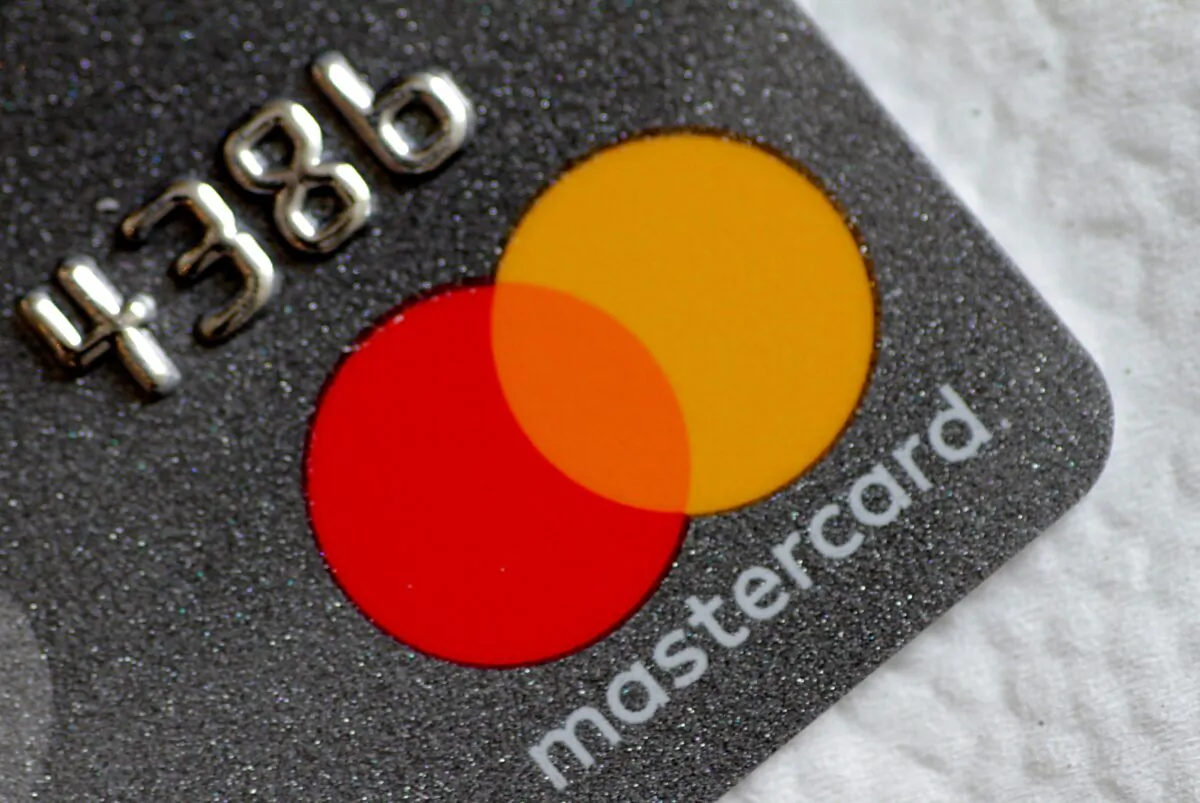 A Mastercard logo is seen on a credit card in this picture illustration taken on Aug. 30, 2017. (Thomas White/Reuters)