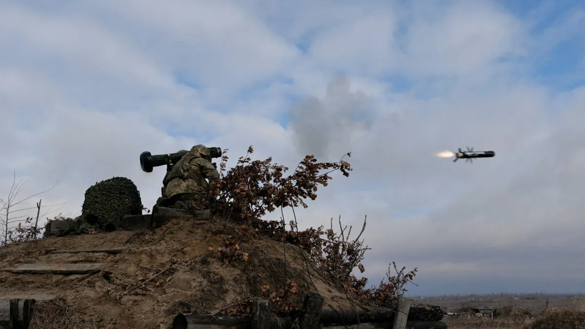 Service members of the Ukrainian Armed Forces fire a Javelin anti-tank missile during drills at a training ground in an unknown location in Ukraine, in a photo released on Feb. 18, 2022. (Ukrainian Joint Forces Operation Press Service/Handout via Reuters)