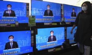 Hong Kong’s Hardline Security Chief Formally Declares Candidacy for Chief Executive