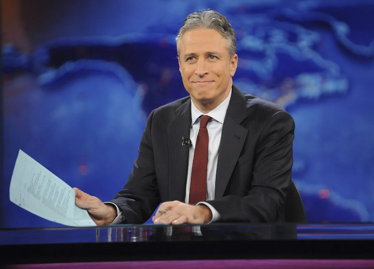 File photo of TV host Jon Stewart during a taping of "The Daily Show" in New York, on Nov. 30, 2011. (AP Photo/Brad Barket, File)