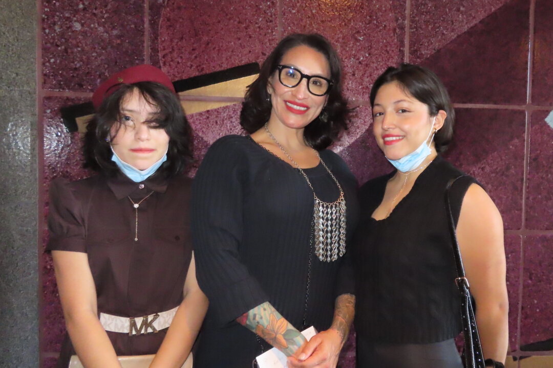 Faith Garcia and her daughters at the April 29 matinee of Shen Yun in Palm Desert, Calif. (Alice Sun/The Epoch Times)