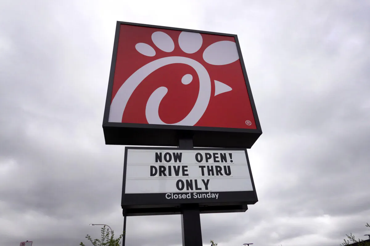 A sign hangs outside of a Chick-fil-A fast-food restaurant in Chicago, Ill., on May 6, 2021. (Scott Olson/Getty Images)