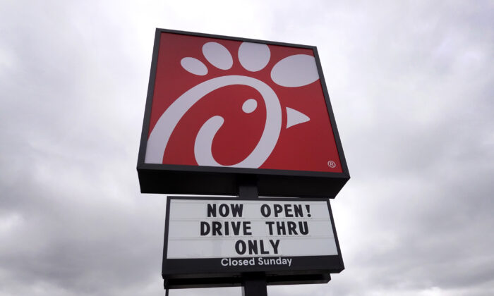 A sign hangs outside of a Chick-fil-A fast-food restaurant in Chicago, Ill., on May 6, 2021. (Scott Olson/Getty Images)