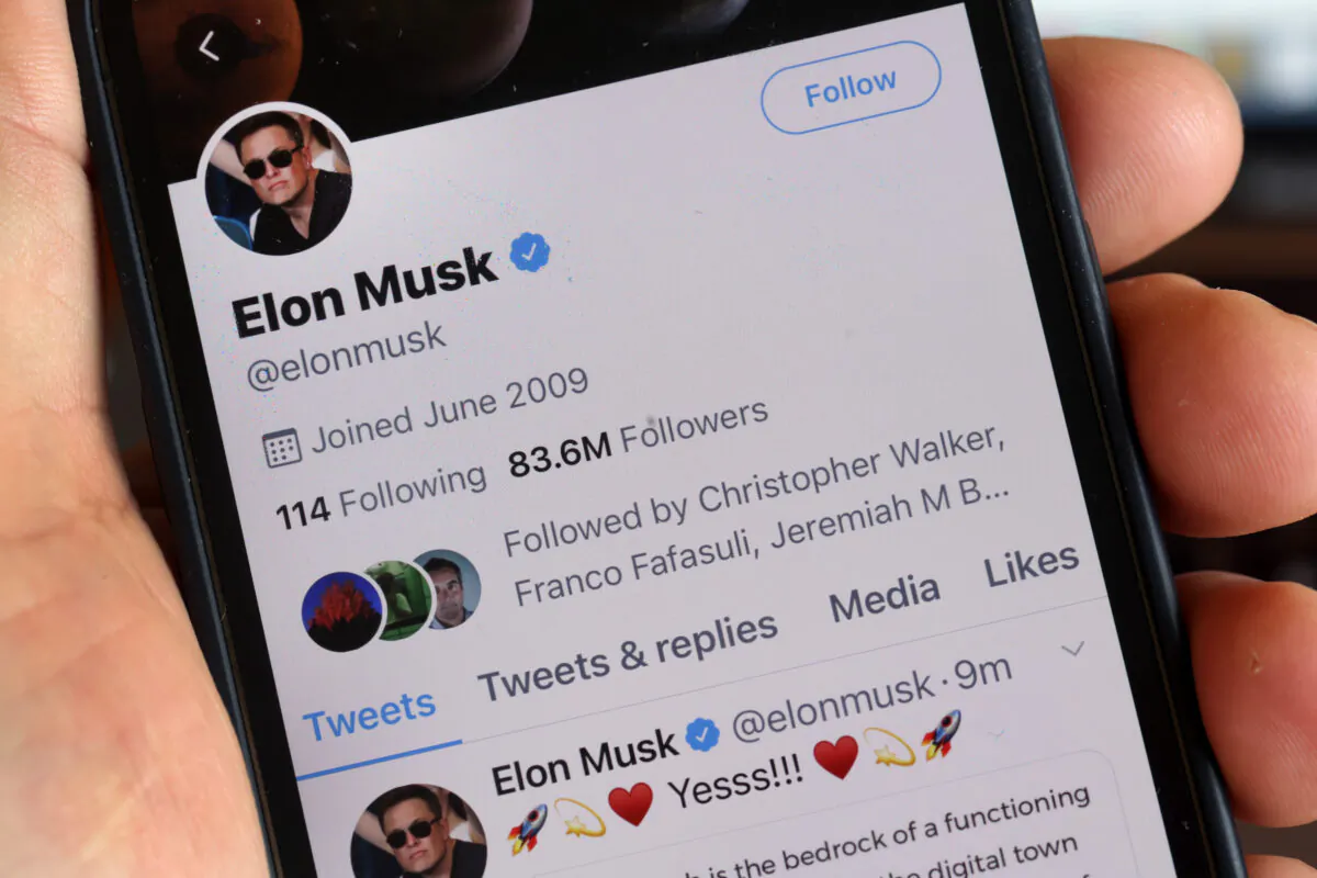 The Twitter profile of Elon Musk with more than 80 million followers in shown on a cell phone in Chicago on April 25, 2022. (Illustration by Scott Olson/Getty Images)