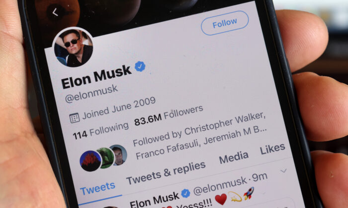 The Twitter profile of Elon Musk with more than 80 million followers in shown on a cell phone in Chicago on April 25, 2022. (Illustration by Scott Olson/Getty Images)