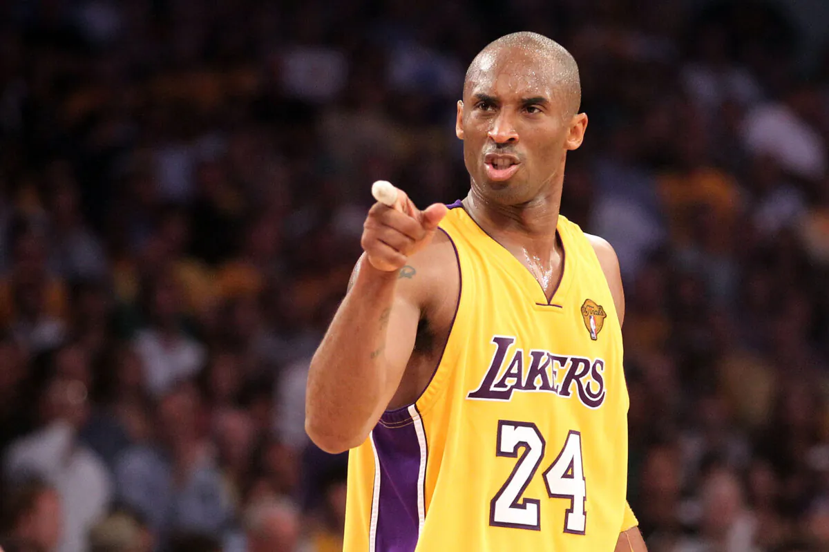 Kobe Bryant #24 of the Los Angeles Lakers points in the second quarter of Game Seven of the 2010 NBA Finals against the Boston Celtics at Staples Center in Los Angeles on June 17, 2010. (Ronald Martinez/Getty Images)