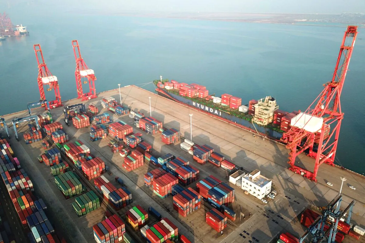 Containers and gantry cranes at a port in Lianyungang in China's eastern Jiangsu province on Dec. 7, 2021. (STR/AFP via Getty Images)