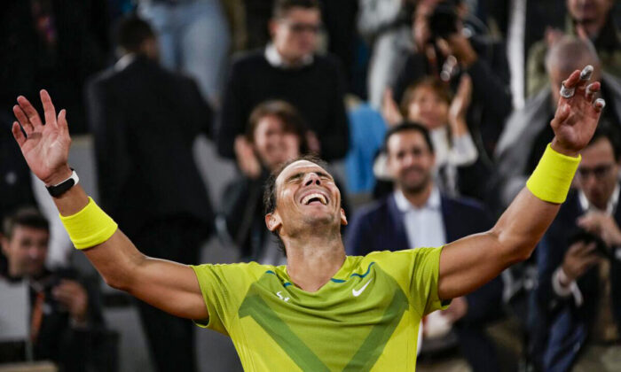 Spain's Rafael Nadal celebrates winning his quarterfinal match against Serbia's Novak Djokovic in four sets, 6–2, 4–6, 6–2, 7–6 (7–4), at the French Open tennis tournament in Roland Garros stadium in Paris, on June 1, 2022. (Christophe Ena/AP Photo)