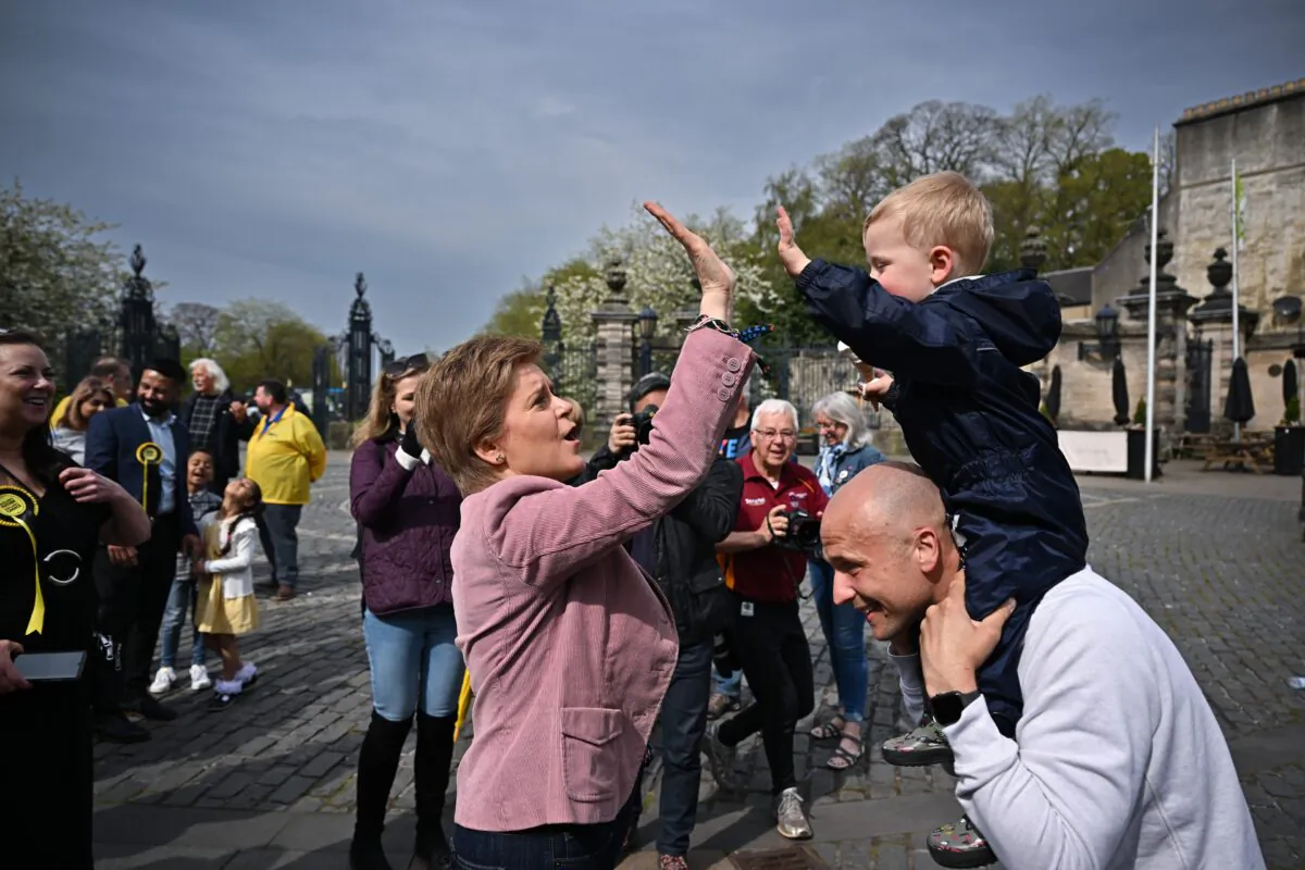 First Minister Nicola Sturgeon meets activists and local candidates during local election campaigning in Dunfermline, Scotland, on April 30, 2022. (Jeff J Mitchell-Pool/Getty Images)