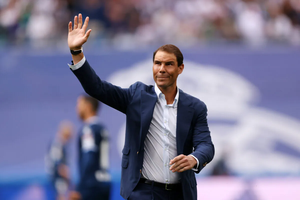 Tennis player Rafael Nadal acknowledges the fans after taking the honorary kick-off prior to the LaLiga Santander match between Real Madrid CF and RCD Espanyol at Estadio Santiago Bernabeu in Madrid, on April 30, 2022. (Gonzalo Arroyo Moreno/Getty Images)