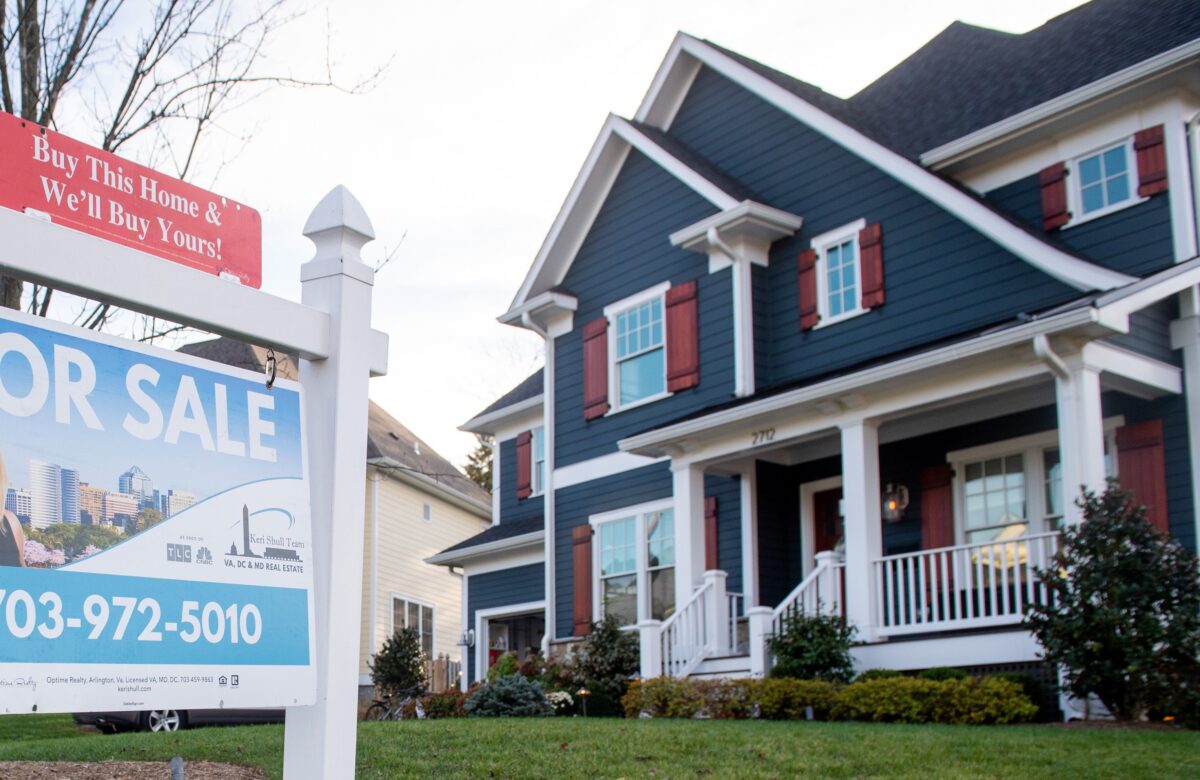 A "for sale" sign is seen in front of a home in Arlington, Va., on Nov. 19, 2020. (Saul Loeb/AFP via Getty Images)