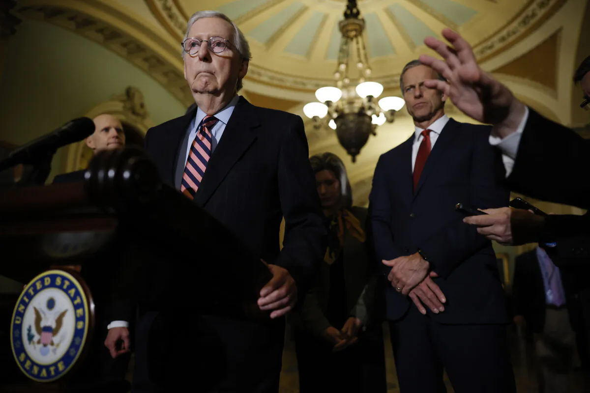 Senate Minority Leader Sen. Mitch McConnell (R-K.Y.) talks to reporters at the U.S. Capitol in Washington on Dec. 14, 2021. (Chip Somodevilla/Getty Images)