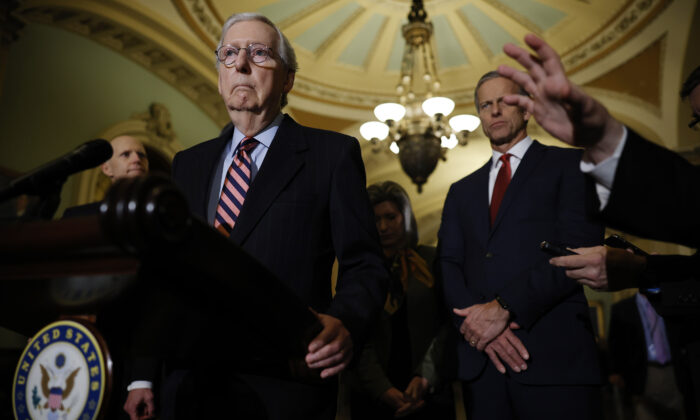 Senate Minority Leader Sen. Mitch McConnell (R-K.Y.) talks to reporters at the U.S. Capitol in Washington on Dec. 14, 2021. (Chip Somodevilla/Getty Images)