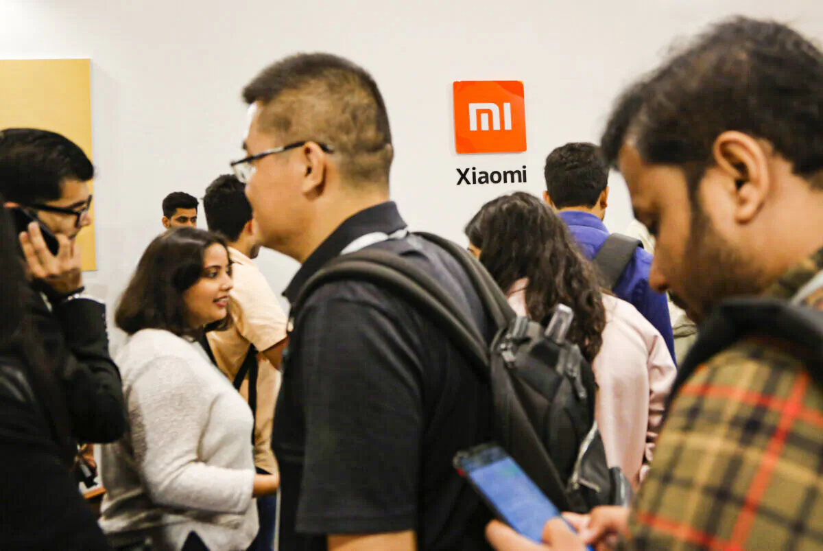 Guests gather to check out Xiaomi's newly launched products at an event in Bangalore, India, on Sept. 17, 2019. (Aijaz Rahi/AP Photo)