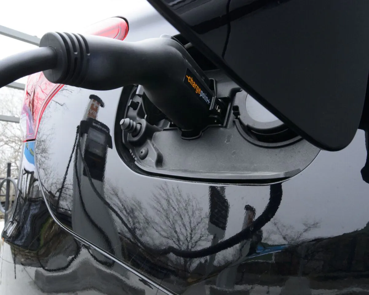 A car is charged at a charge station for electric vehicles on Parliament Hill in Ottawa on May 1, 2019. (The Canadian Press/Sean Kilpatrick)