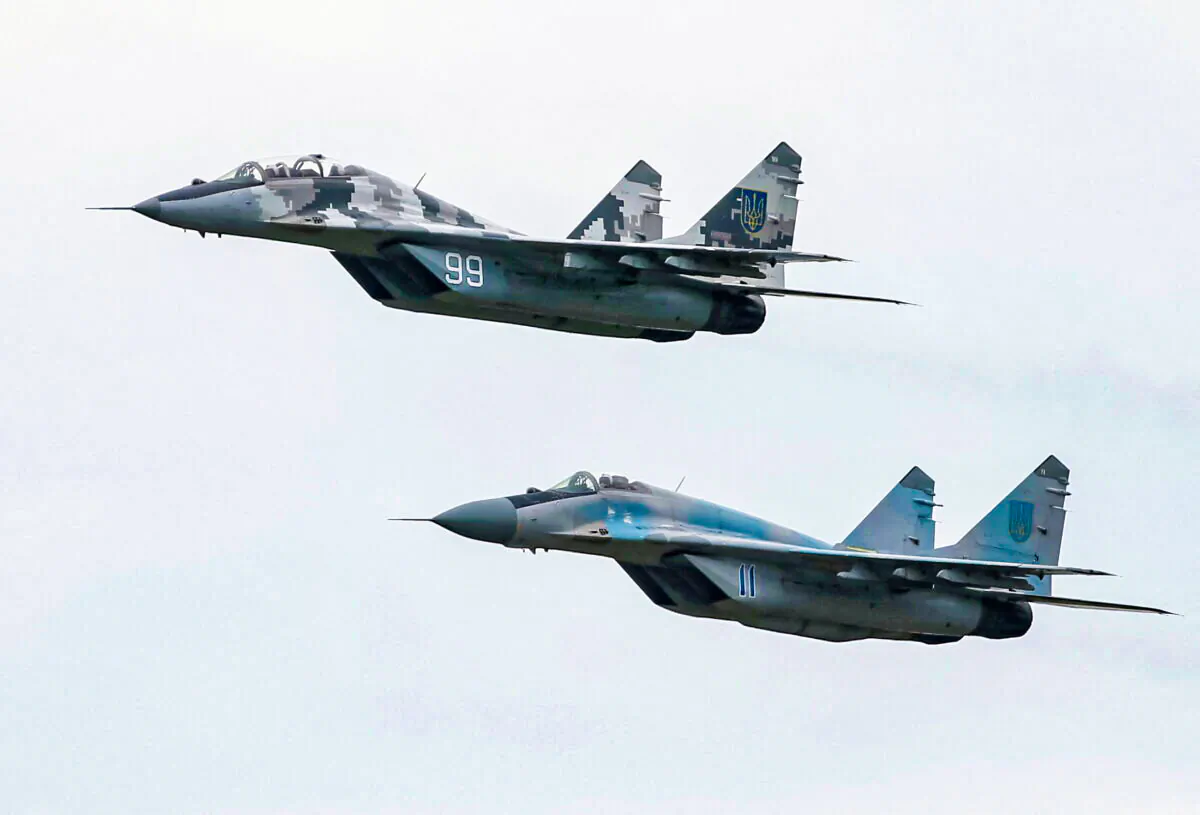 MIG-29 fighter aircrafts fly at a military air base in Vasylkiv, Ukraine, in a file image. (Gleb Garanich/Reuters)